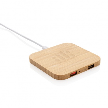Logotrade reklaamtooted pilt: Bambusest 10 W juhtmevaba laadija USB-ga